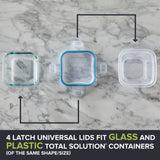 Glass containers with latch universal lids on a marble surface