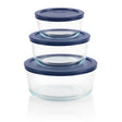 Set of three clear glass containers with blue lids on a white background