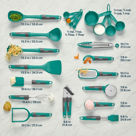 Set of green kitchen utensils with measurements on a light gray background