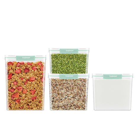 Snapware® 4-piece plastic canister set with mint green lids, including four clear food storage containers filled with cereal, peas, rice, and sugar.