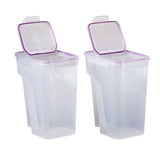 Two clear storage containers with purple lids on a white background