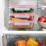 Stack of food storage containers with vegetables inside, placed on a refrigerator shelf.